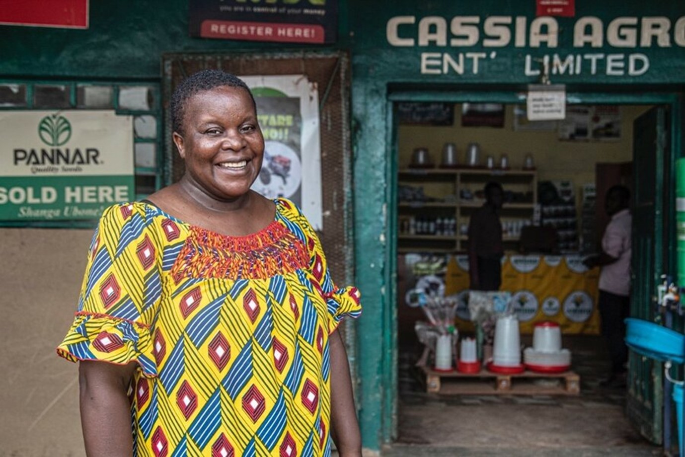 Ederbry Mweendo, Director of Cassia Agro Enterprises, outside her shop in Monze District, Zambia. Photo: WFP/Catherine Zulu