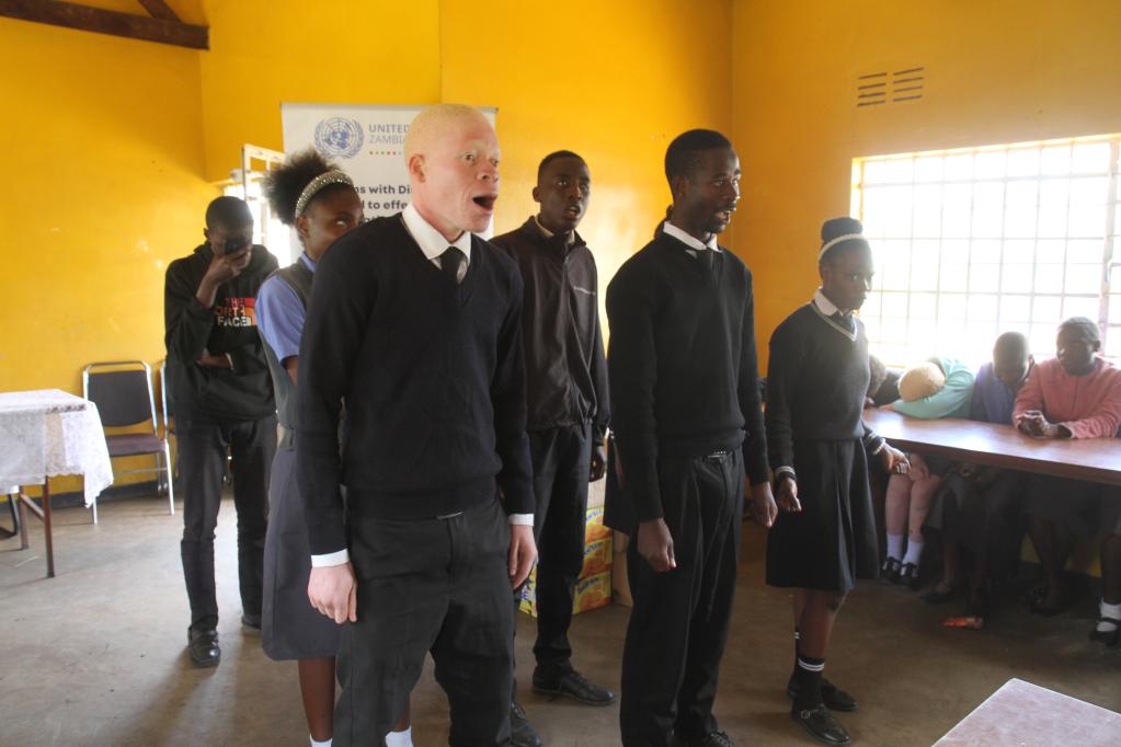 Learners presenting poem