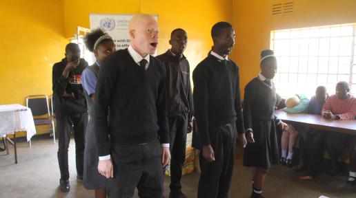 Learners presenting poem